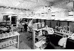 Click here to enlarge image Coherent/Adlas manufacturing facility in Germany uses robotic workstations in a cleanroom for high-volume production of diode-pumped solid-state lasers. Click here to enlarge image Coherent/Adlas manufacturing facility in Germany uses robotic workstations in a cleanroom for high-volume production of diode-pumped solid-state lasers.