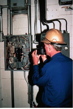 FIGURE 2. Infrared detectors form the heart of thermal imaging cameras used for industrial inspection. This technician inspects an electrical motor-control center with a ThermaCAM IR focal-plane-array camera. FIGURE 2. Infrared detectors form the heart of thermal imaging cameras used for industrial inspection. This technician inspects an electrical motor-control center with a ThermaCAM IR focal-plane-array camera.