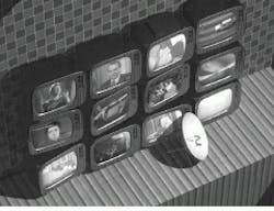 Hologram of 12 stacked television sets was computer rendered with 300 separate perspective images—a matrix of 20 along the horizontal axis and 15 along the vertical. One image (top) is a perspective from the upper left and the other (bottom) shows a head-on view. The finished hologram is a solid-appearing 3-D image having horizontal and vertical parallax. In addition, a holographic stereogram was formed by 'inserting' 15 frames of digitized video into each television. Thus, the viewer can 'watch' the videos by tilting the hologram vertically and can 'move around' the sets by tilting side to side. This image took 40 hours to render on two Silicon Graphics machines. Hologram of 12 stacked television sets was computer rendered with 300 separate perspective images—a matrix of 20 along the horizontal axis and 15 along the vertical. One image (top) is a perspective from the upper left and the other (bottom) shows a head-on view. The finished hologram is a solid-appearing 3-D image having horizontal and vertical parallax. In addition, a holographic stereogram was formed by 'inserting' 15 frames of digitized video into each television. Thus, the viewer can 'watch' the videos by tilting the hologram vertically and can 'move around' the sets by tilting side to side. This image took 40 hours to render on two Silicon Graphics machines.