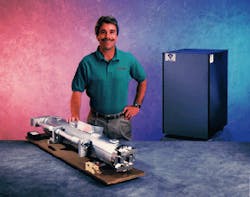 Comparison of 500-W sealed laser with older 500-W slow-flow laser (in box) shows the significant reduction in laser size made possible by slab-discharge laser technology. Comparison of 500-W sealed laser with older 500-W slow-flow laser (in box) shows the significant reduction in laser size made possible by slab-discharge laser technology.