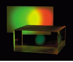 High-dispersion holographic grating for spectral processing is optimized for operation at 1064 nm. Cube construction permits high incident angles on grating that allow high levels of dispersion.