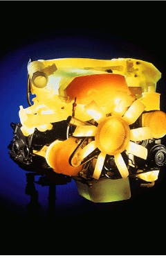 FIGURE 2. Rapid-prototyping process creates automotive part with air-cooled, Q-switched diode-pumped solid-state laser and liquid polymer. FIGURE 2. Rapid-prototyping process creates automotive part with air-cooled, Q-switched diode-pumped solid-state laser and liquid polymer.