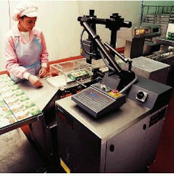 Carbon dioxide laser-based Xymark coding system places batch code and expiration data on frozen-food packages. Carbon dioxide laser-based Xymark coding system places batch code and expiration data on frozen-food packages.