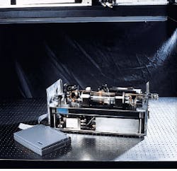 FIGURE 1. Compact laser-based gas sensor contains Nd:YAG laser, diode laser, and periodically poled lithium niobate in package measuring only 1 × 1 × 2 ft. Difference-frequency generation produces 4.6-µm radiation that was used in field tests in which this instrument was capable of monitoring CO concentrations at the parts-per-billion level. FIGURE 1. Compact laser-based gas sensor contains Nd:YAG laser, diode laser, and periodically poled lithium niobate in package measuring only 1 × 1 × 2 ft. Difference-frequency generation produces 4.6-µm radiation that was used in field tests in which this instrument was capable of monitoring CO concentrations at the parts-per-billion level.