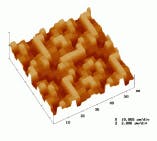 FIGURE 2. Atomic force micrograph shows the computer-generated-holographic dispersing element of the CTIS, which forms a 7 × 7 array of diffraction orders at each wavelength within the bandpass of the instrument; it is designed to equalize diffraction signal levels among orders. FIGURE 2. Atomic force micrograph shows the computer-generated-holographic dispersing element of the CTIS, which forms a 7 × 7 array of diffraction orders at each wavelength within the bandpass of the instrument; it is designed to equalize diffraction signal levels among orders.