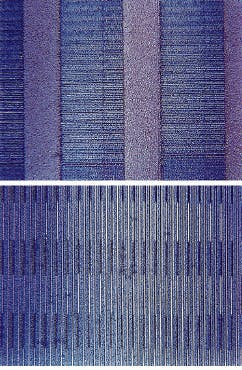 FIGURE 1. Imation Super Disk diskette (top, seen at 320X magnification) has 2490 data tracks/in. compared to just 135 tracks/in. for conventional 1.44-Mbyte 3.5-in. diskettes (bottom, 320X magnification). The 80-times increase in storage capacity is achieved by etching a servo pattern into the diskette with a 2-W Millennia II diode-pumped visible-output laser. FIGURE 1. Imation Super Disk diskette (top, seen at 320X magnification) has 2490 data tracks/in. compared to just 135 tracks/in. for conventional 1.44-Mbyte 3.5-in. diskettes (bottom, 320X magnification). The 80-times increase in storage capacity is achieved by etching a servo pattern into the diskette with a 2-W Millennia II diode-pumped visible-output laser.