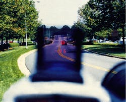 FIGURE 1. Head-up display in Digital LaVideo laser gun is generated using a proprietary telephoto optical system and a high-brightness, light-emitting-diode source. High-brightness LED source is required to provide readable display in ambient conditions of up to 10,000 fL such as might be expected during a sunny day with snow on the ground. FIGURE 1. Head-up display in Digital LaVideo laser gun is generated using a proprietary telephoto optical system and a high-brightness, light-emitting-diode source. High-brightness LED source is required to provide readable display in ambient conditions of up to 10,000 fL such as might be expected during a sunny day with snow on the ground.