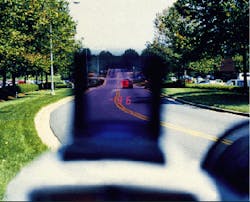 FIGURE 1. Head-up display in Digital LaVideo laser gun is generated using a proprietary telephoto optical system and a high-brightness, light-emitting-diode source. High-brightness LED source is required to provide readable display in ambient conditions of up to 10,000 fL such as might be expected during a sunny day with snow on the ground.