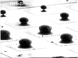 Array of mushroom microlenses on an array of light emitting-diodes (LEDs) improves light efficiency and throughput of the devices by up to eight times compared to unaided LEDs. Array of mushroom microlenses on an array of light emitting-diodes (LEDs) improves light efficiency and throughput of the devices by up to eight times compared to unaided LEDs.