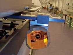 A photograph shows the retroreflector in the long arm of the interferometer. A photograph shows the retroreflector in the long arm of the interferometer.