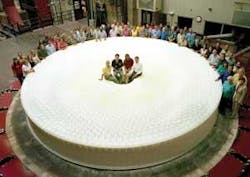 FIGURE 1. The LSST mirror has been cast and is ready for grinding and polishing. The outer 5- to 8.4-m-diameter portion will serve as the primary mirror; the inner 5-m-diameter portion will be ground to a steeper curvature and will become the telescope’s tertiary mirror. FIGURE 1. The LSST mirror has been cast and is ready for grinding and polishing. The outer 5- to 8.4-m-diameter portion will serve as the primary mirror; the inner 5-m-diameter portion will be ground to a steeper curvature and will become the telescope’s tertiary mirror.