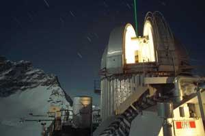 FIGURE 1. The Jungfraujoch observatory in the Swiss Alps houses instrumentation that uses vibrational Raman spectroscopy to measure water vapor in the troposphere, as well as rotational Raman spectroscopy to perform temperature measurements on air molecules at altitudes up to 20 km. Differential-absorption LIDAR (DIAL) is also used to measure ozone in the troposphere.