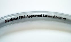 FIGURE 2. On-the-fly laser marking on clear medical-grade tubing with FDA-approved additives produces jet-black marking contrast. FIGURE 2. On-the-fly laser marking on clear medical-grade tubing with FDA-approved additives produces jet-black marking contrast.