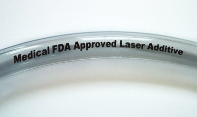 FIGURE 2. On-the-fly laser marking on clear medical-grade tubing with FDA-approved additives produces jet-black marking contrast.