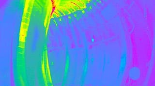 An infrared camera view shows the inside of the JET fusion vessel.