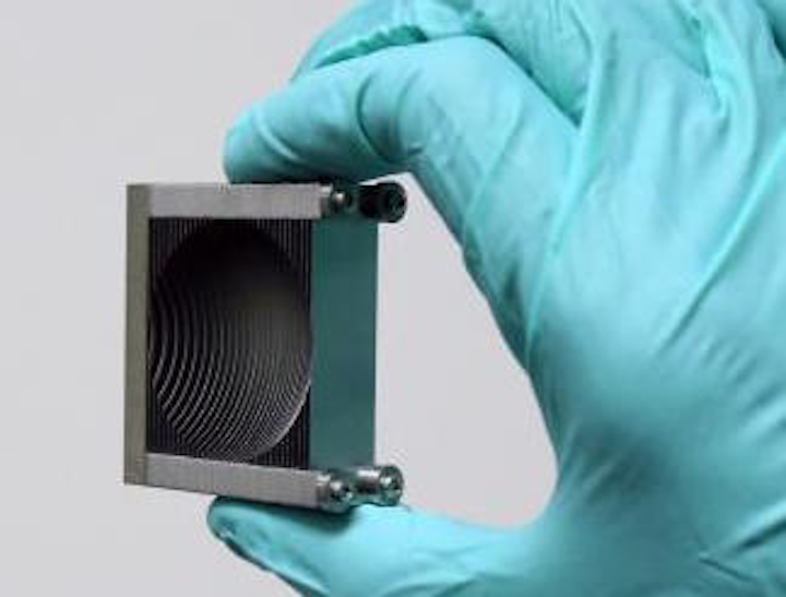 Stacked, formed metal plates form terahertz-focusing lens