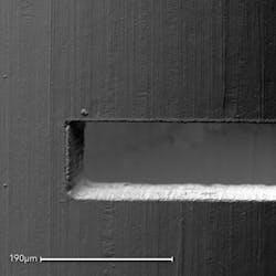 FIGURE 3. These blind holes in a 100&mu;m cobalt-chromium (CoCr) wire show the ability of femtosecond lasers to ablate a surface without micro-cracking.