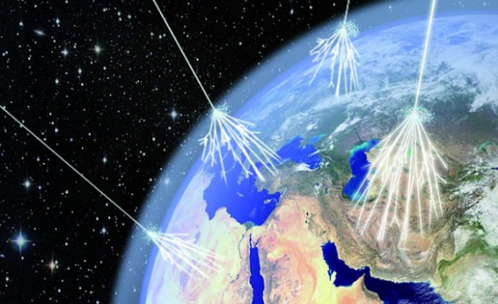 An illustration shows 'air showers' that result when ultrahigh-energy cosmic rays strike the top of the Earth's atmosphere and collide with air nuclei, producing other particles that lose most of their energy before reaching the ground. (Image credit: Asimmetrie/INFN, via CERN)