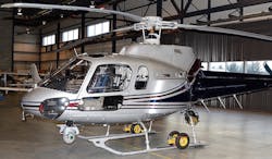 The electro-optic/infrared (EO/IR) payload is seen mounted below a helicopter's nose (bottom left). The electro-optic/infrared (EO/IR) payload is seen mounted below a helicopter's nose (bottom left).