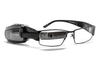 Vuzix M100 smart glasses are being paired with visual aid software from CyberTimez that magnifies text up to 15 times, improving vision for the low-vision and nearly blind community.