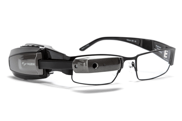 Vuzix M100 smart glasses are being paired with visual aid software from CyberTimez that magnifies text up to 15 times, improving vision for the low-vision and nearly blind community.