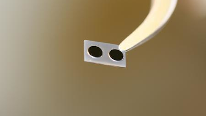 Solitons are created in optical microcavities like these, where the solitary waves circle around the tiny disks at the speed of light. (Image credit: Qi-Fan Yang/Caltech)