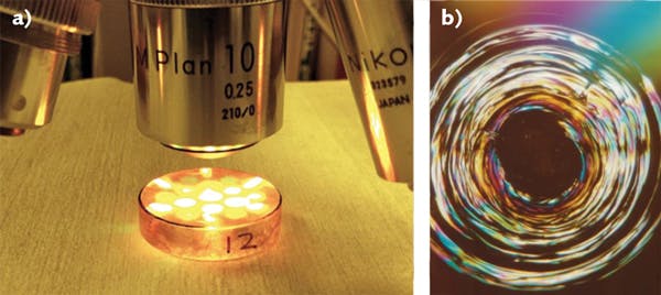 FIGURE 2. Optical inspection using 150 reflective Nomarksi microscopy (a) reveals laser damage (b).