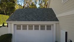 Elon Musk of Tesla launches stylish solar roof tiles that generate electricity to be stored in a battery for future use.