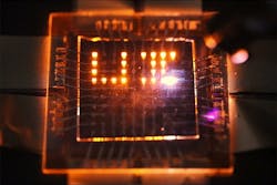 A laser stylus writes on a small array of multifunction pixels made by dual-function LEDs that can both emit and respond to light. A laser stylus writes on a small array of multifunction pixels made by dual-function LEDs that can both emit and respond to light.