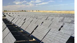 An array of silicon photovoltaic panels collects power from the sun. Solar-Tectic is developing a method to deposit crystalline coatings on inexpensive glass, which could be used as a base for thin-film crystalline solar cells.
