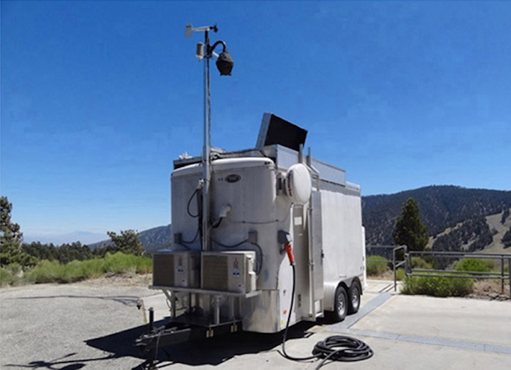 A photograph shows the Autonomous Mobile Ozone Lidar Instrument for Tropospheric Experiments (AMOLITE) mounted in a climate-controlled mobile trailer. (Image credit: SPIE Newsroom)
