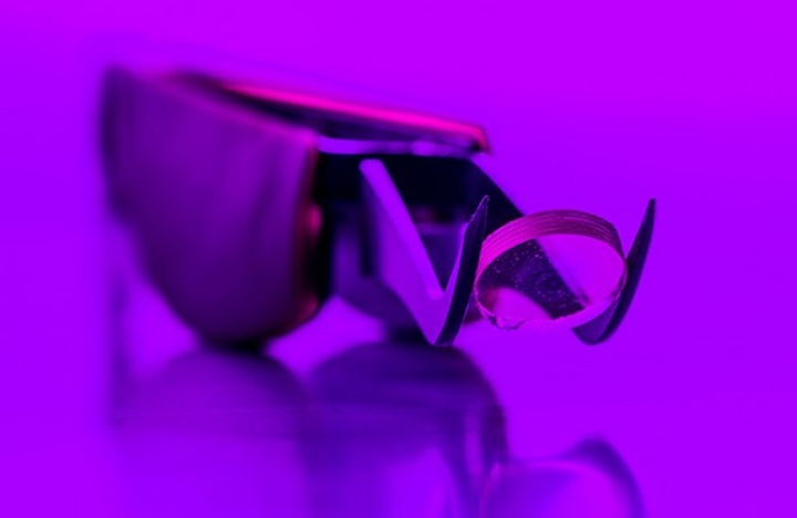 LLNL researchers have reported the synthesis of 3D printed transparent glass components using a slurry of silica particles extruded through a direct-ink writing process. (Image credit: LLNL)