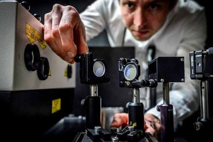 Elias Kristensson of Lund University works on the ultrafast five trillion frame-per-second camera. (Image credit: Kennet Ruona/Lund University)