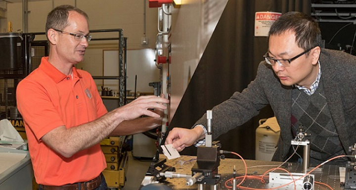 John Ballato (left) and Lin Zhu are receiving a combined $3.2 million from the Department of Defense to develop high-energy lasers. (Image credit: Clemson University)