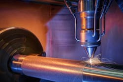 A team from Aachen, Germany, developed an ultra-high-speed laser material deposition procedure where the metal powder is molten before it hits the workpiece.