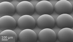 Array of hemispherical micro-optics fabricated with a Photonic Professional GT. Array of hemispherical micro-optics fabricated with a Photonic Professional GT.