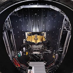 NASA's James Webb Space Telescope (JWST) is suspended from Minus K vibration isolators on top of Chamber A at NASA's Johnson Space Center in Houston. NASA's James Webb Space Telescope (JWST) is suspended from Minus K vibration isolators on top of Chamber A at NASA's Johnson Space Center in Houston.