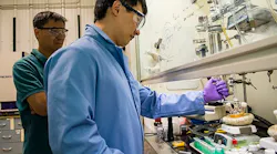 Los Alamos National Laboratory (LANL) Chemist Jaehoon Lim works on an apparatus that synthesizes quantum dots along with LANL researcher Young-Shin Park (also with the University of New Mexico Center for High-Technology Materials). LANL colleagues Kaifeng Wu and Victor Klimov worked with Lim and Park to demonstrate that negatively charged quantum dots show promise for low-power laser applications or quantum dot laser diodes.