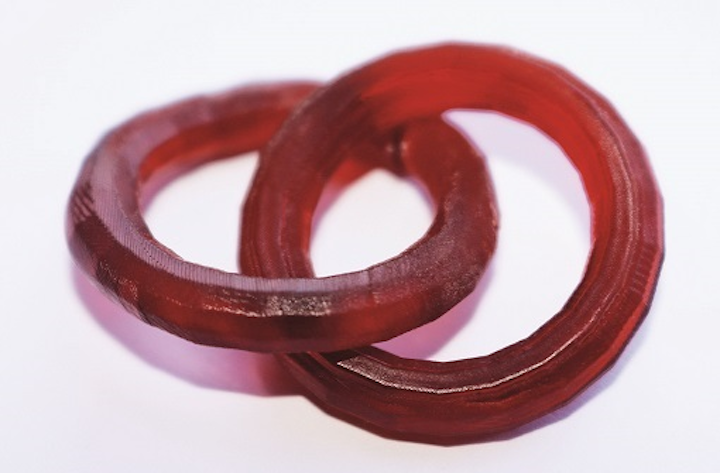Using the new 'TwoCure' process, a 3D printed ring-in-ring structure is manufactured without support structures and without platform contact. (Image credit: Fraunhofer ILT & Rapid Shape)
