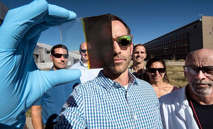 Lance Wheeler (front) developed a switchable photovoltaic window along with (from left) Nathan Neale, Robert Tenent, Jeffrey Blackburn, Elisa Miller, and David Moore. (Image credit: Dennis Schroeder/NREL)