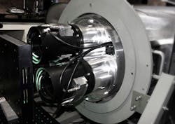 Ultralarge-format lenses are shown mounted in the B66 Aerial Surveillance camera. Ultralarge-format lenses are shown mounted in the B66 Aerial Surveillance camera.