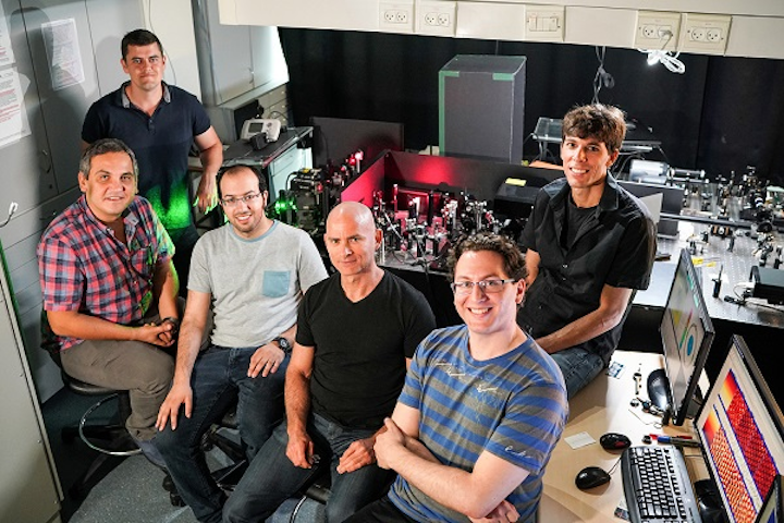 Research participants in the Bartal lab at the Faculty of Electrical Engineering at Technion are shown (right to left): professor Netanel Lindner, Shai Tsesses, professor Guy Bartal, Kobi Cohen, Evgeni Ostrovsky, and Bergin Gjonaj. (Image credit: ATS)