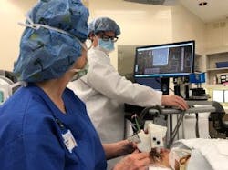 A new handheld ophthalmology instrument allows imaging of photoreceptors in the eyes of young children, as pictured here; it could help to improve the diagnosis of eye diseases and eventually find use in early detection of brain-related diseases and trauma. A new handheld ophthalmology instrument allows imaging of photoreceptors in the eyes of young children, as pictured here; it could help to improve the diagnosis of eye diseases and eventually find use in early detection of brain-related diseases and trauma.