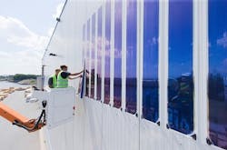 Installation of the organic photovoltaic (OPV) façade in the port of Duisburg was rapid and easy, and will generate energy for years to come. Installation of the organic photovoltaic (OPV) façade in the port of Duisburg was rapid and easy, and will generate energy for years to come.