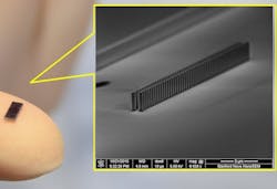 An accelerator chip is shown on the tip of a finger along with an electron microscope image of the chip. An accelerator chip is shown on the tip of a finger along with an electron microscope image of the chip.
