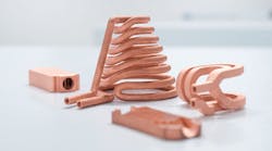 3D-printed components made of pure copper are shown.