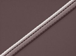 Scanning electron micrograph shows a dispersive grating for the pulse compressor before deposition of silicon dioxide overcladding.