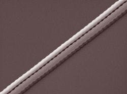Scanning electron micrograph shows a dispersive grating for the pulse compressor before deposition of silicon dioxide overcladding. Scanning electron micrograph shows a dispersive grating for the pulse compressor before deposition of silicon dioxide overcladding.
