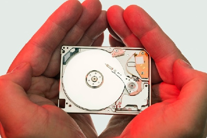 Hard disk drives have been the data storage staple for decades, but new nonthermal photomagnetic optical storage techniques are being developed. (Image credit: Daniel Sambraus /Getty Images)