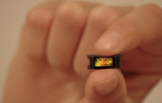 Shown is the tiny, integrated, chip-based 1550 nm lidar vision sensor from a silicon photonics startup.